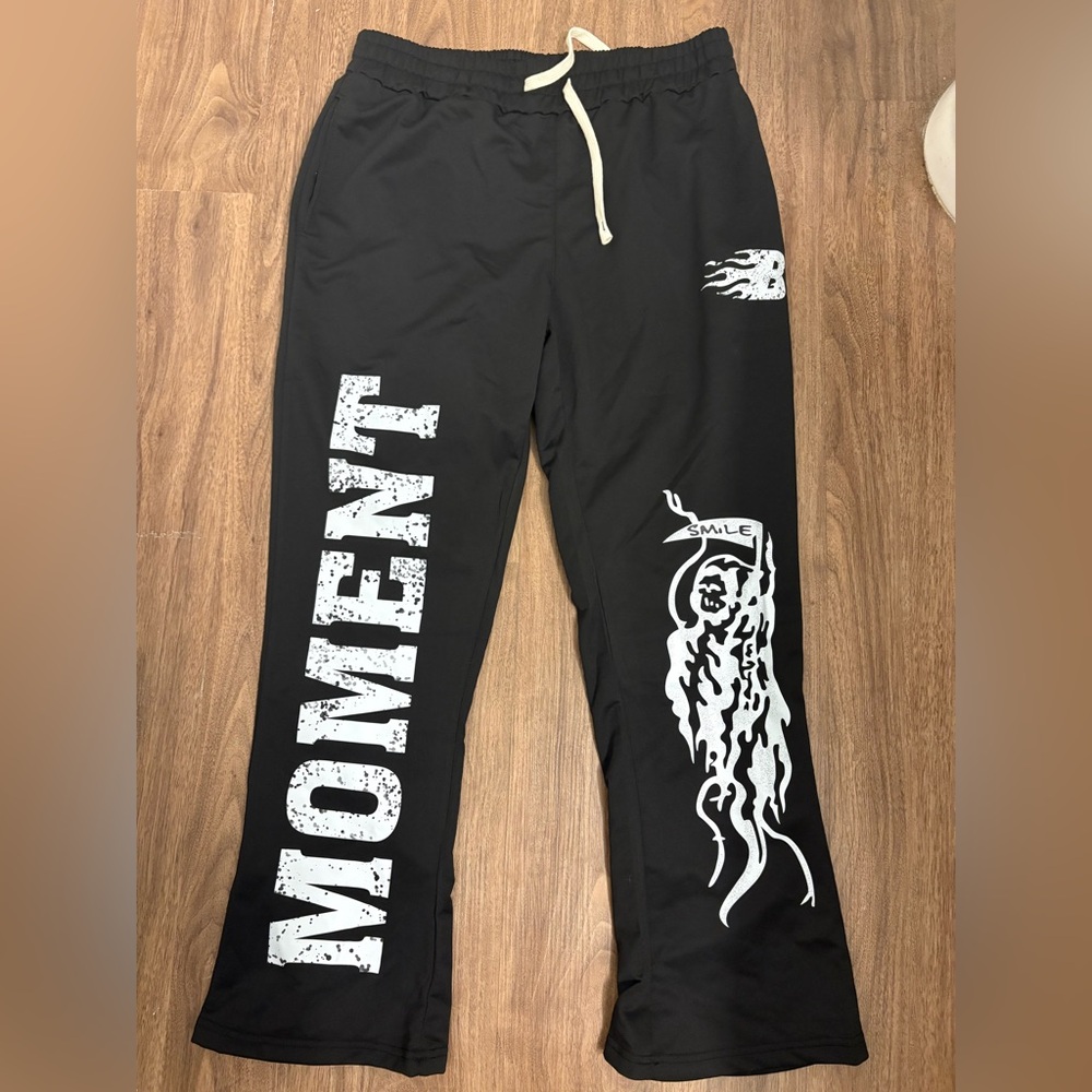“Elevate Your Comfort: Premium Black New Balance Sweatpants in Size Large!”